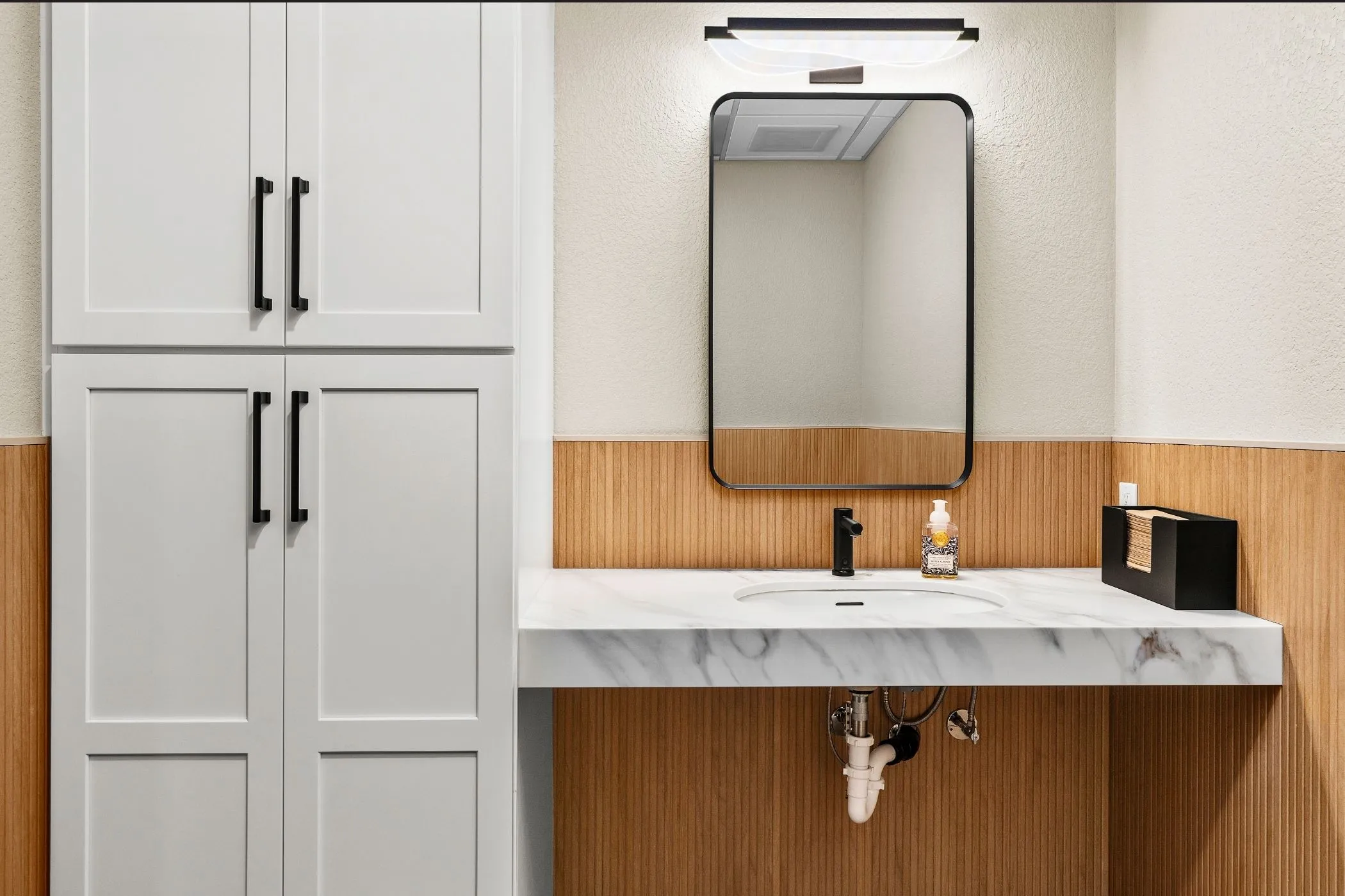Rustic modern office remodel commercial interior design olympia wa employee bathroom