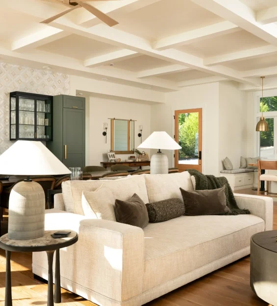 Open-concept living and dining area with custom furnishings at Sound View Estate in Olympia, WA