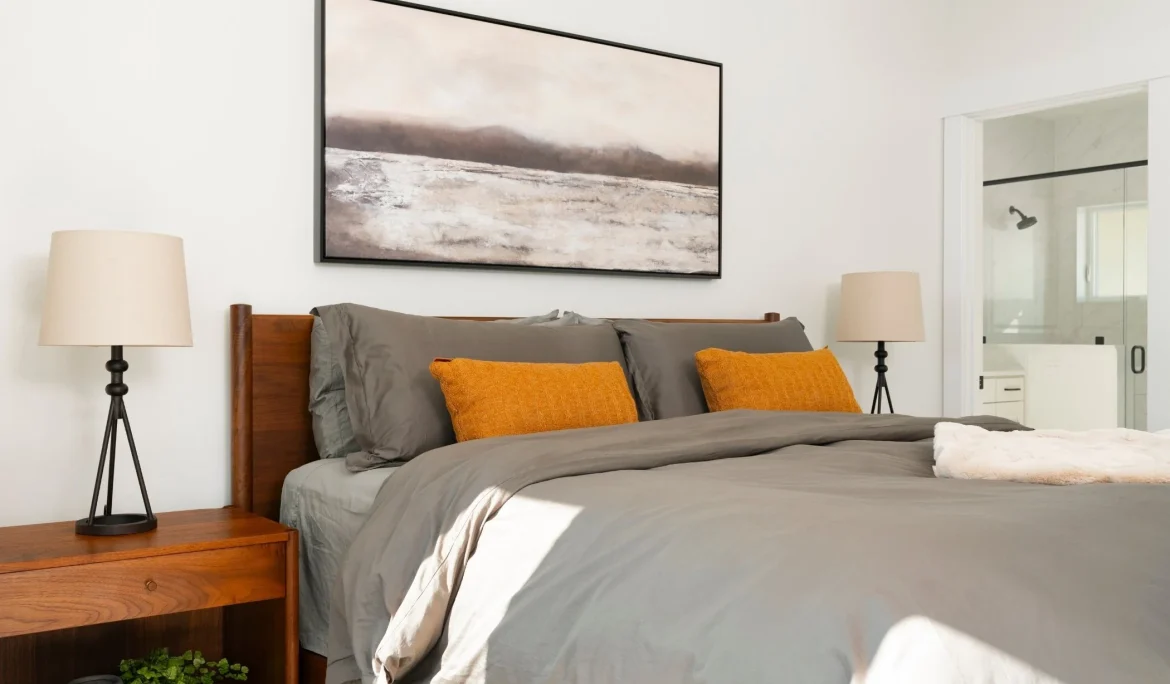 Detail view of primary bedroom styling and custom furnishings at Sound View Estate in Olympia, WA