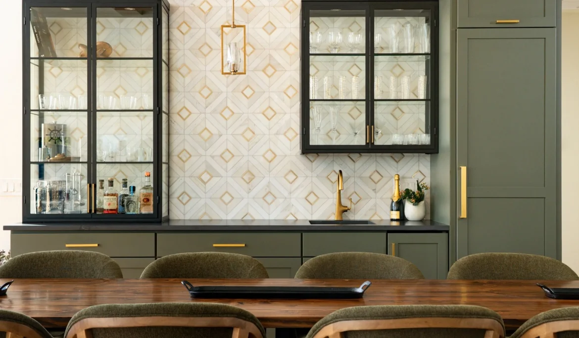 Custom whiskey and champagne bar with metal and glass cabinetry designed by HC Spec + Design in Olympia, WA